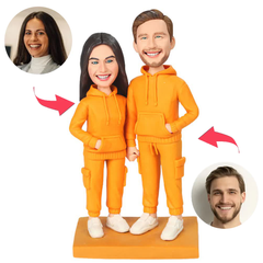 Couple in Orange Sweatshirts Custom Bobbleheads