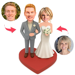 Wedding couple standing on huge red heart custom bobbleheads